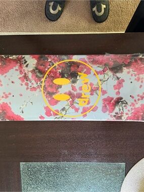 DREW Floral Skate Deck with Yellow Logo on Pink Blossoms